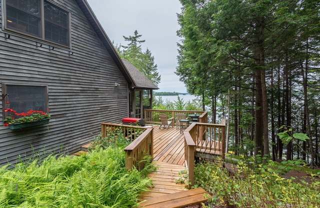 Gorgeous lakefront home w/dock, canoe, kayaks & lake/forest views