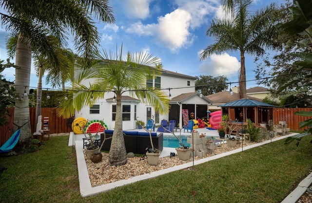Gorgeous Urban Oasis w/Hot Tub, HEATED POOL and Private Movie Theater by RedAwning