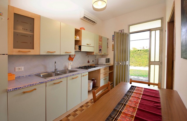 Green House - Apartment surrounded by greenery a few steps from the beach