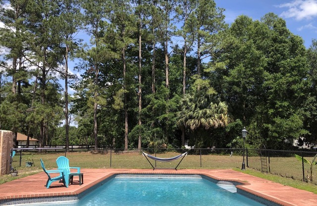 Green pastures with pond & pool in Silver Springs