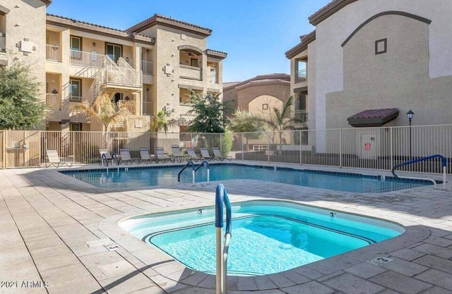 Ground Floor 2 BDR with Garage! Heated Comm Pool!