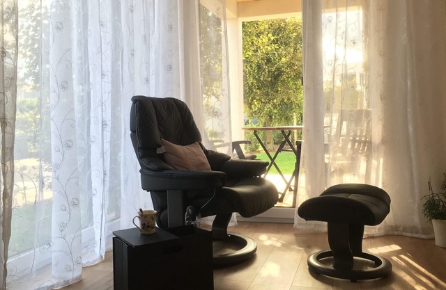 Ground-floor, disabled-friendly vacation apartment with small terrace, adjoining sunbathing lawn and lockable bicycle storage room