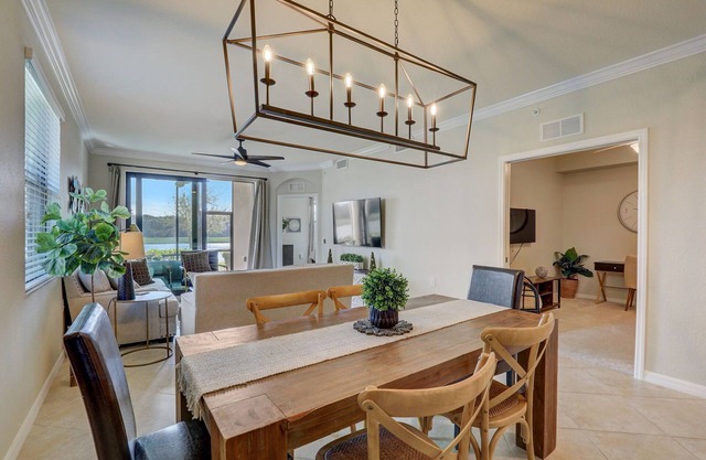 GROUND FLOOR End unit 2 Bed/2bath+Den, Beautiful water view, 2 Golf Courses