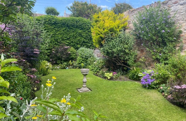 Ground Floor garden apartment only a few steps from the shore.
