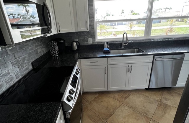 Gulf Access Home with a Boat Dock and Pool