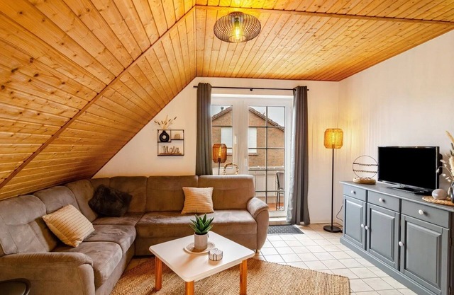 Hübsche Ferienwohnung in Nessmersiel, mit Balkon, Wlan, Haustiere Gestattet.wallbox