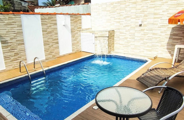 House with swimming pool with LED, waterfall, barbecue, vertical garden