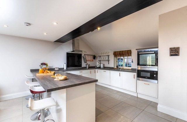 H C Property 'The Byre'