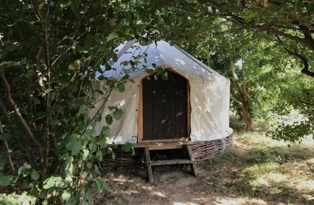 Handcrafted Grain Store Yurt in Somerset woodland; off-grid relaxation, campfire