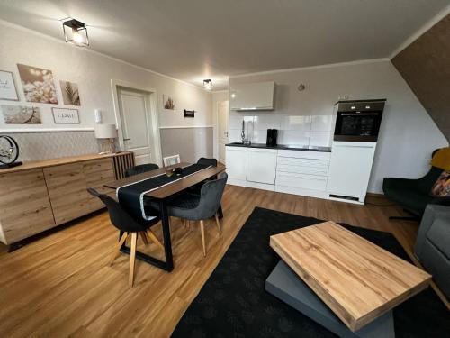 Haus-Fehmarn-am-Dorfteich-|-Wohnung-1-Sued