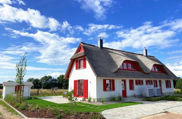 Haus zwischen Mühle und Meer