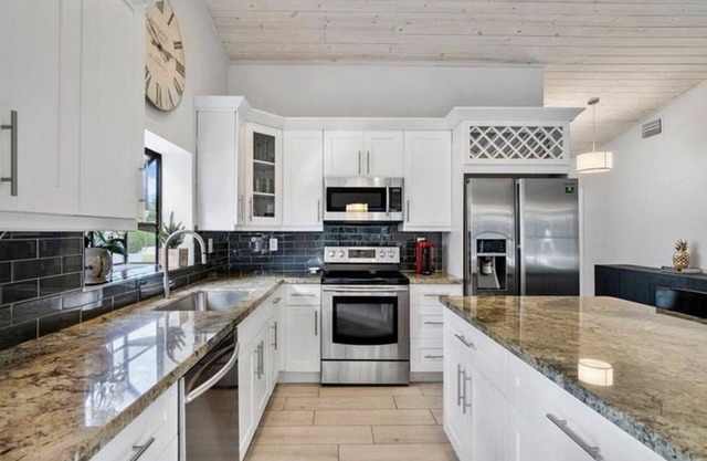 Heated Saltwater Pool! Beautiful Activity Filled Three BR Home Downtown Delray