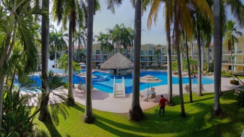 Hermoso Depa en Diamante Lakes Frente Arena GPN
