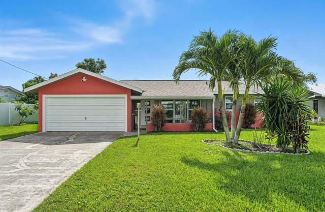 HGTV Featured! Coral Escape – Pool, Canal Access, Waterfront & Beach Nearby