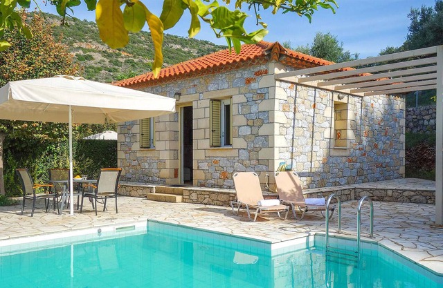 Hidden away on the outskirts of the quaint, little village of Kardamili, this traditional stone hous