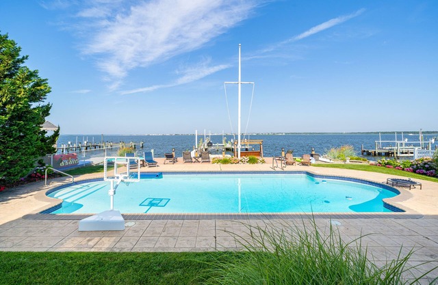 High-end Bay front Oasis with Pool and Short Walk to Beach