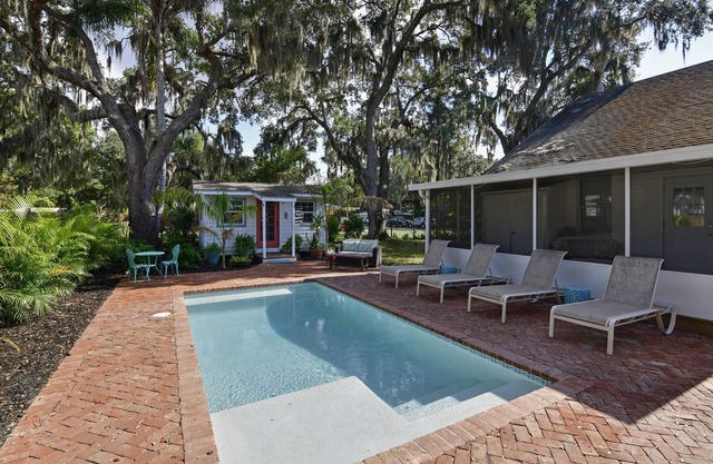 Historic 1930s Cottage + Heated Pool + 12mi to beaches & 1 mi to downtown