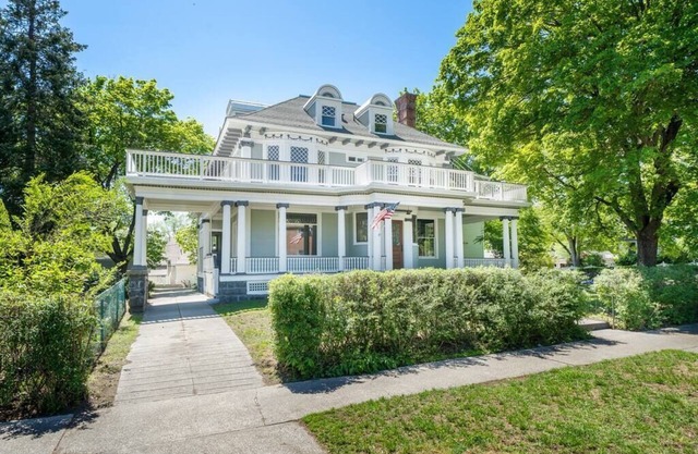 Historic Family Home with 8 BDRMS, 8 BATHS & 3 Kitchens!