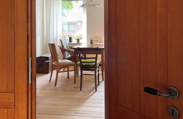 Historic house under lime trees with natural garden. Family-friendly.
