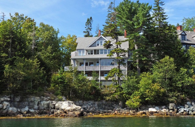 Historic Summer Cottage with stunning views of the harbor and modern amenities.