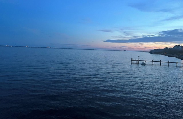 Historical converted tavern surrounded by water, fabulous views, private dock.