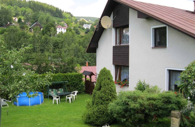 Holiday apartment with large garden and outdoor swimming pool