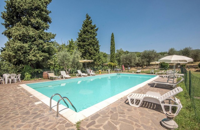 Holiday Apartment 'Bilocale Brando' with Pool, Garden & Wi-Fi