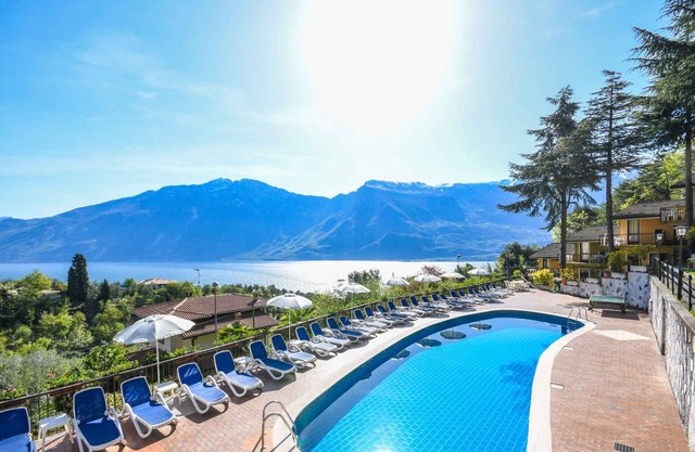 Holiday apartment with balcony or terrace, air conditioning and pool