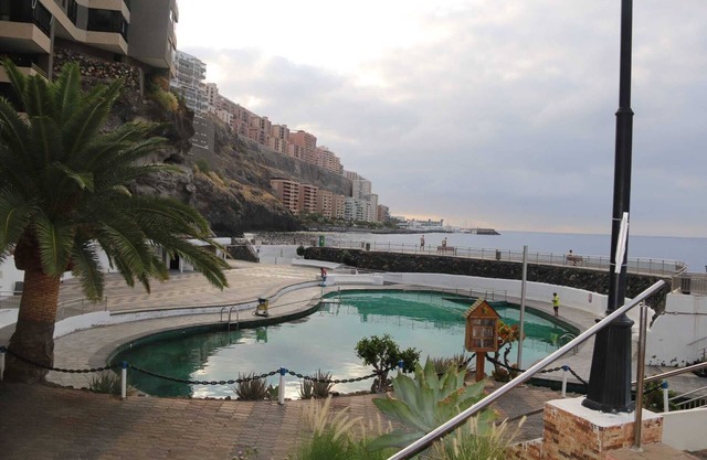 Holiday Apartment "Beachfront Seaview Oasis" with Sea View, Shared Pool & Wi-Fi