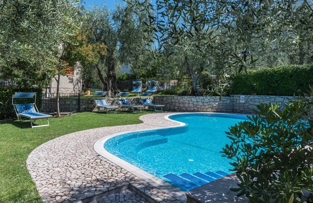 Holiday Apartment “Casa Stefi N1” close to lake Garda with Balcony, Garden & Pool