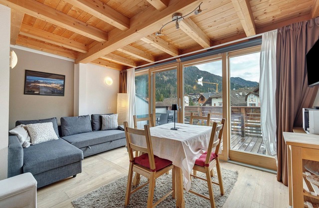 Holiday Apartment 'Ciasa Irene Mansarde' near Ski Slopes with Terrace & Mountain View