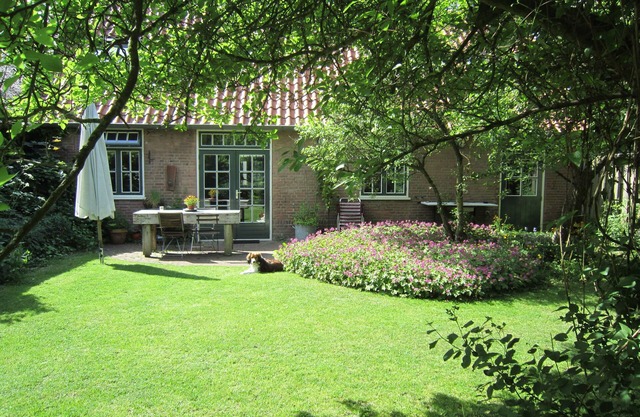 Holiday apartment in a large garden, in a tiny village close to beach and dunes