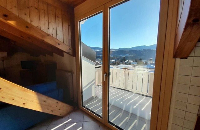 Holiday apartment in light and large attic flat with wooden beams