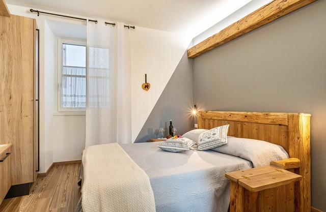 Holiday Apartment 'L'Antica Corte Apt Elena' with Mountain View, Terrace & Wi-Fi