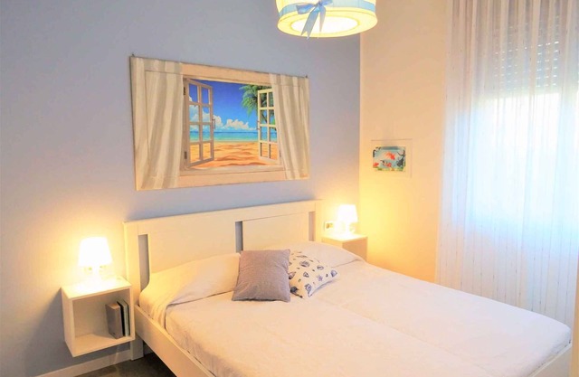 Holiday apartment on the ground floor with garden and shared swimming pool