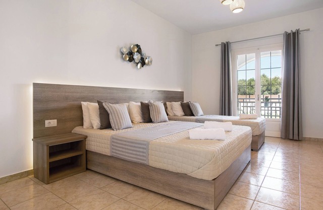 Holiday Apartment "Tropical Studio 3" with Shared Garden, A/C & Wi-Fi