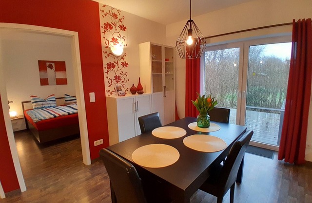 Holiday Apartment "Wikingerland Typ 1 Erdgeschoss" with Private Terrace, Shared Garden & Wi-Fi