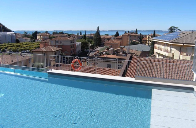 Holiday apartment with air conditioning, internet, balcony and rooftop pool