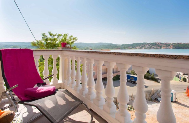 Holiday apartment with balcony and sea view