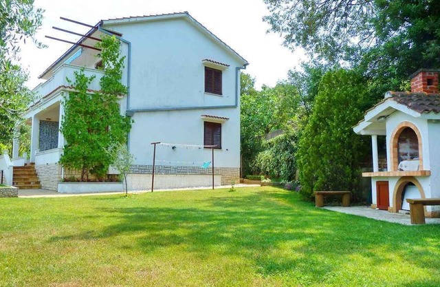 Holiday apartment with terrace and air conditioning