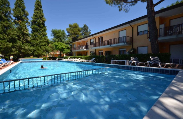 Holiday apartment with pool in quiet location