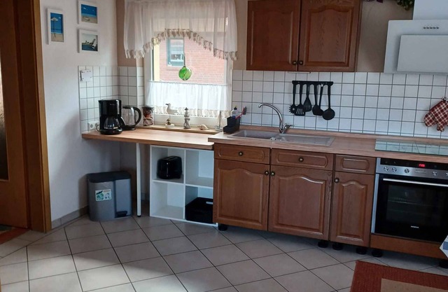Holiday apartment with use of garden and barbecue