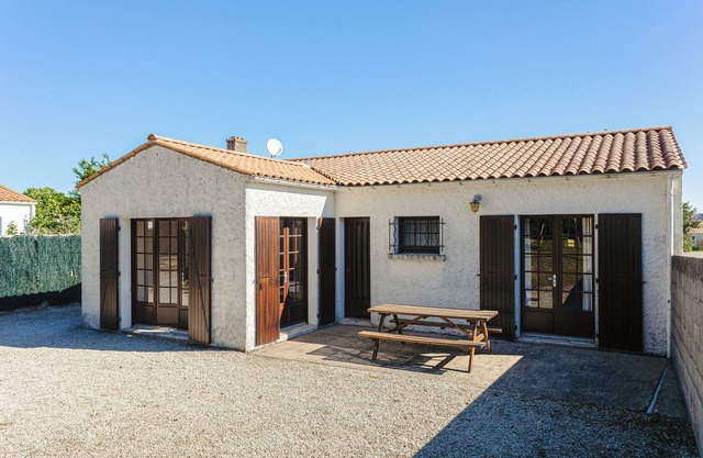 Holiday Home 'Maison Au Coeur De Grand Village' with Terrace and Garden