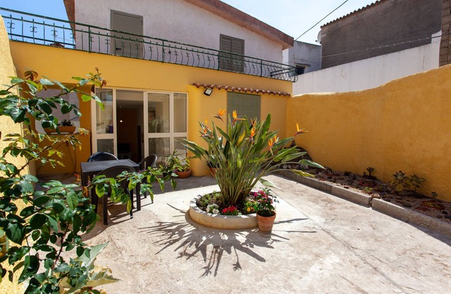 Holiday Home 'Appartamento Irgoli - Sardegna' with Patio, Wi-Fi and Air Conditioning
