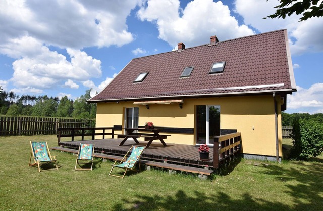 Holiday Home by Lake with Boat in Poland