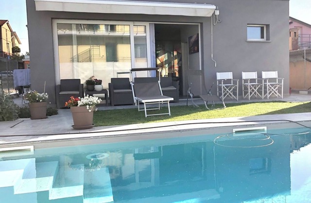 Holiday Home 'Chalet Al Mare' with Private Pool, Private Garden and Air Conditioning