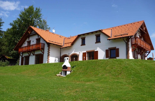 Holiday home with fireplace, sauna and garden at Lake Lipno
