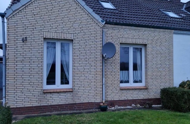 Holiday Home 'Ferienhaus Küstenperle' with Private Terrace, Shared Garden and Wi-Fi