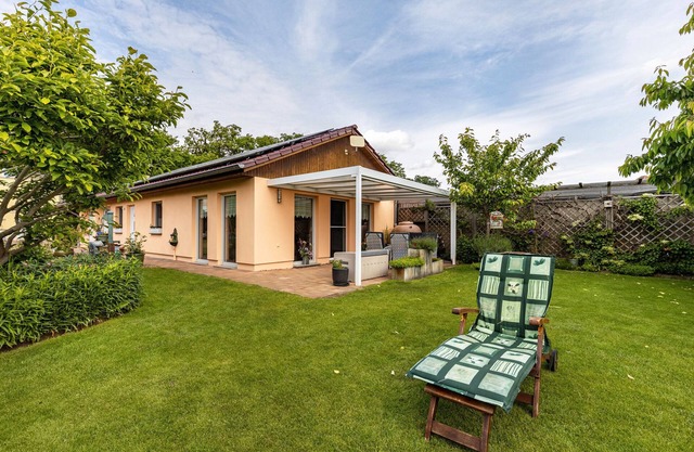 Holiday Home 'Ferienhaus 75 Qm, 1 Schlafzimmer' with Private Terrace, Shared Garden and Wi-Fi