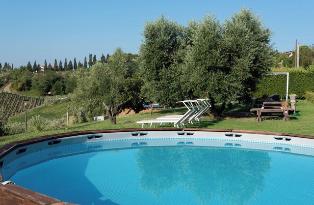Holiday Home 'Girasole Apartment' with Shared Pool, Private Terrace and Air Conditioning